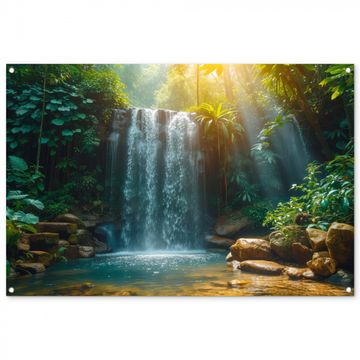 Tuinposter - Tropische Waterval in Zonlicht